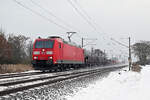 Am 06.01.26 führte 185 187 bei leichtem Schneefall ihren gemischten Güterzug durch Greppin Richtung Dessau.