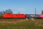185 377 zieh ihren Containerzug nach Bremerhaven. Bei Bremerhaven Wulsdorf, 6.3.26