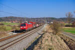 185 184 DB Cargo mit einem gemischten G�terzug bei Oberdachstetten Richtung W�rzburg, 28.03.2022