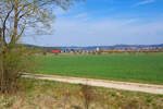 Eine unbekannte 185 mit einem leeren Erzzug bei P�lling Richtung N�rnberg, 14.04.2022