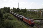 185 010 (9180 6185 010-6 D-DB) hat viele Rohre am Haken und ist in Richtung Wanne unterwegs. (30.05.2009)