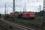 185 262-3 mit eienm gemischtem Gterzug fuhr am 28.05.2009 in den Seelzer Rbf. ein.Interressant fand ich die drei gelben Waggons.