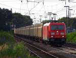 185 378-7 durchfhrt mit einem Holz transportierenden Gterzug die Hildener Gterstrecke am 28.07.09