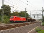 185 248-2 mit einem Ganzzug Schttgutwagen auf dem Weg Richtung Braunschweig. Fotografiert kurz hinter Magdeburg Hbf in Hhe Platz des 17. Juni/Sachsenring am 08.08.2009