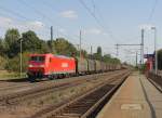 185 171-6 mit einem gemischten Gterzug in Niederndodeleben. Der Zug kam aus Richtung Magdeburg, fotografiert am 26.09.2009. 