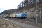 BR 185 523-8 mit dem Warsteiner-Bierzug vom Mnchen-Riem nach Warstein kurz vor der Einfahrt in den Eggetunnel, Willebadessen 27.03.2010