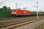 185 246-6 mit einer Ladung Rundeisen auf den Waggons. Zwischen Growudicke und Rathenow. 01.04.2010