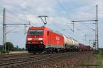 185 278 mit einem gemischten Güterzug am 21.8.2010 in Dedensen.