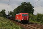 185 234 mit einem gemischten Gterzug am 25.08.2010 in Hannover-Ahlten.