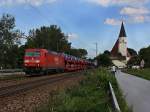 Die 185 311 am 05.09.2010 mit einem Autozug unterwegs bei Hausbach. 