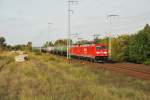 Br 185 293-8 + Br 185 xxx-x mit ein Kesselwagenzug durch der Berliner Wuhlheide, 06/10/2010.