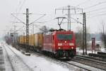 185 288 mit einem Containerzug am 05.12.2010 in Mnchen Langwied.