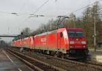 Ein fast ganz roter Lokzug, gezogen von 185 257-3 in Richtung Norden. Aufgenommen am 16.02.2011 in Eichenberg.