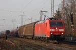 Bei schnem Abendlicht kam 185 081 mit einem gemischten Gterzug durch Ratingen-Lintorf.Aufgenommen am 4.3.11 