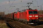 185 081-7 + 185 225-0 mit einem Kohlezug bei der Durchfahrt durch Dsseldorf-Rath am 28.03.2011