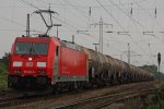 DB/Green Cargo 185 402 am 19.5.11 mit einem Kesselzug in Ratingen-Lintorf.Nach einem etwas lngeren Halt durfte der Zug weiter in Richtung Duisburg fahren.Gru an die beiden Tf!