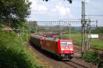 185 221-9 durchfhrt mit ihrem gemischten Gterzug den Bbf Langeland in richtung Altenbeken, 05.06.2011.