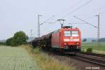 185 002 mit einem gemischten Gterzug am 15.06.2011 in Holtensen/Linderte