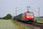 185 151 mit einem Aufliegerzug am 15.06.2011 in Holtensen/Linderte.