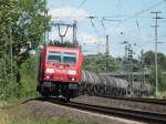 185 304-3 mit einem Kesselzug am Haken am 15.07.2011 auf der KBS 480 von Kln kommend bei Aachen Rothe Erde auf dem Weg nach Aachen West.