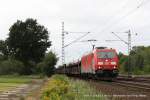 185 334-7 (DB Schenker / green cargo) fhrt am 29. Juli 2011 um 15:04 Uhr mit einem Gterzug durch Halstenbek