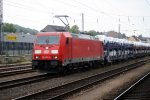 185 369-6 fhrt mit einem Audi-Autozug  durch den Trierer-HBF in Richtung Trier-Erhang bei Sonne und Wolken.
29.7.2011