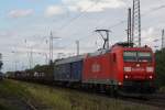 Die Railion 185 165 zieht am 27.8.11 einen LÜ Begleitwagen und einen Güterzug durch Ratingen-Lintorf.
