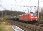 Zwei BR 185er durchfahren mit einem lzug Kln-West aus Aachen kommend und fahren in Richtung Kln-Gremberg am 3.1.2012.