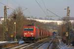 Die 185 285-4 fuhr am 31.01.2012 durch das verschneite Eilendorf.