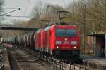 185 379-5 und 185 250-8 ziehen am 09.03.2012 einen kurzen Kesselzug von Aachen West ber die KBS480 durch die Baustelle bei Eilendorf Richtung Kln.