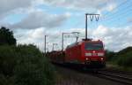 185 183-1 fuhr am 12.07.2012 mit einem Güterzug von Emden nach Osnabrück, hier bei Veenhusen.