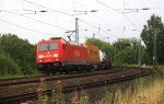 185 227-6 von Railion zieht einen Containerzug aus Richtung Kln und fhrt nach Aachen-West .Aufgenommen kurz vor dem Burtscheider-Viadukt in Aachen bei Wolken am 20.7.2012.