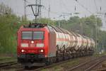 185 059 am 4.5.12 mit einem Kesselzug bei der Durchfahrt durch Ratingen-Lintorf.