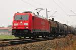 E-Lok BR 185 303-5 der DB Logistic RAILION mit Kesselwagen in Richtung Mnchen bei bersee im ersten Herbstnebel am 22.10.12.