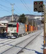 Kombiverkehr 185 664 am 14.12.2012 mit dem SLB  Kaindlzug  61825 (Liefering - Httau Terminal) bei der Durchfahrt in Salzburg-Sd.
