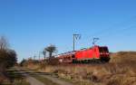 185 160-9 fuhr am 12.03.2013 mit einem Autozug von Emden nach Osnabrck, hier bei Veenhusen.