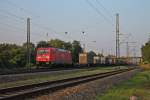 Am frhen Morgen des 11.07.2013 fuhr DB Schenker 185 267-2 zusammen mit einem Containerzug durch den Bahnhof von Orschweier gen Norden.