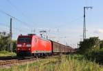 Am 24.Juli 2013 verlie DBSR 185 193 mit H-Wagen den Bahnhof Mllheim(Baden) in Richtung Offenburg.
