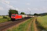 185 357 mit einem gemischten Güterzug am 06.07.2013 bei Dettenhofen.