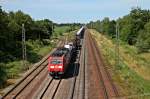 Am 06.06.2014 bespannte 185 112-0 einen gemischten Güterzug, als sie durch Orschweier weiter Richtung Freiburg fuhr.