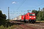 Am 06.06.2014 fuhr 185 262-3 mit einem DB Schenker-KLV durch die Bahnanlagen von Orschweier gen Freiburg.