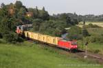 185 220-1 (DB Schenker) mit einem Containerzug in Elze, 23. Juli 2014