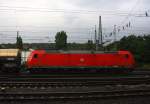 185 010-6 DB fährt mit einem langen Kesselzug Antwerpen-Noord(B) nach Burghausen(D) bei der Ausfahrt aus Aachen-West und fährt in Richtung Aachen-Schanz,Aachen-Hbf,Köln. 
Aufgenommen vom Bahnsteig in Aachen-West bei Regenwolken am 22.8.2014.