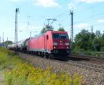 185 208 mit gemischten  Anhängseln  fährt am 28.08.2014 durch Leipzig-Thekla.