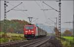 185 360-5 ist am 11.11.14 mit einen Coilzug bei Haarbach unterwegs.