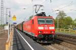 185 092-4 am 18.04.2014 bei der Durchfahrt mit einem gemischten Güterzug in Müllheim (Baden) in Richtung Schweiz.