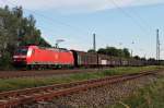 Ausfahrt am 06.06.2014 von DBSC 185 135-1 mit einem Redbull Zug aus Bludenz in Orschweier vom Überholgleis.