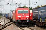 Durchfahrt am 23.07.2014 von 185 238-3 mit einem gemischten Containerzug in Müllheim (Baden) gen Schweiz.