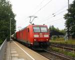 185 066-8 und 185 163-3 beide von DB  kommen als Umleiter mit einem langen Kesselzug aus Ludwigshafen-BASF(D) nach Antwerpen-BASF(B) und fahren durch Kohlscheid aus Richtung Herzogenrath und fahren  die Kohlscheider-Rampe hoch nach Aachen-West.
Bei Sonne und Gewitterwolken am Nachmittag vom 5.7.2015.