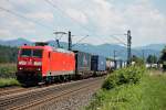 Mit einem Containerzug fuhr am 01.08.2014 die 185 159-1 bei Kollmarsreute gen Norden.